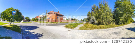 Brest Belarus colorful village streets with wooden huts brick houses . Brest Belarus colorful village streets with wooden huts brick houses . 128742120