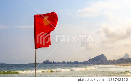 Red Flag on Copacabana Leme Beach Rio de Janeiro Brazil. Red Flag on Copacabana Leme Beach Rio de Janeiro Brazil. 128742150