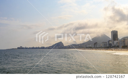 Copacabana Beach Tropical Paradise and City Skyline Rio de Janeiro Brazil. Copacabana Beach Tropical Paradise and City Skyline Rio de Janeiro Brazil. 128742167