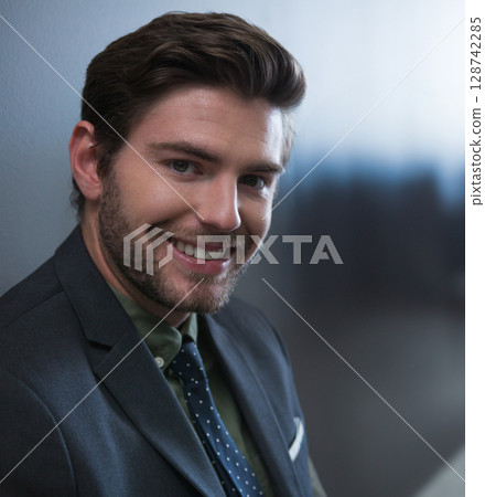 Male business professional smiling at camera in office, wearing olive-green shirt and polka-dot tie Male business professional smiling at camera in office, wearing olive-green shirt and polka-dot tie 128742285