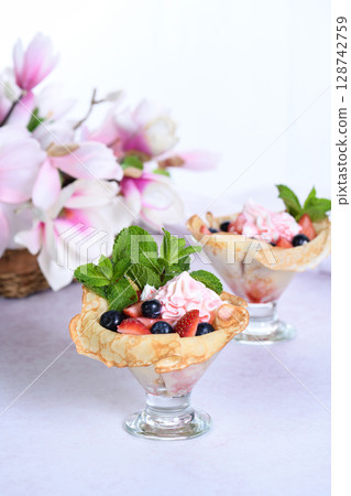 French Crepes with Filling and Fruit French Crepes with Filling and Fruit 128742759