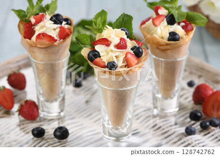 Delicious Japanese crepes with berries Delicious Japanese crepes with berries 128742762