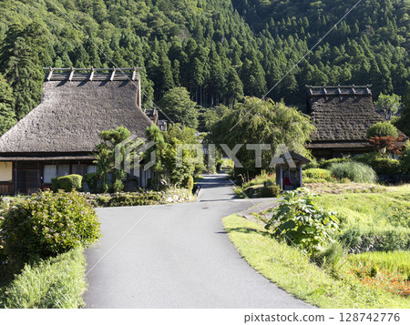 Miyama Kayabuki Village illuminated by the midsummer sun Miyama Kayabuki Village illuminated by the midsummer sun 128742776