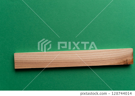 Simple background of wooden boards on a green background 128744014