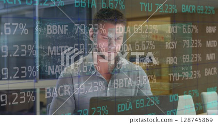 Image of data processing over caucasian businessman using laptop in office 128745869
