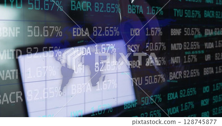 Studying man wearing headphones navigating map grid with ticker overlays at workstation, copy space Studying man wearing headphones navigating map grid with ticker overlays at workstation, copy space 128745877