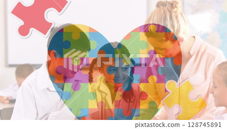 Autism awareness day text over caucasian female teacher and students at school 128745891