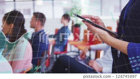 Image of financial data processing over business people 128745897