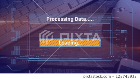 Image of loading over digital screen, mouse and keyboard on desk 128745932
