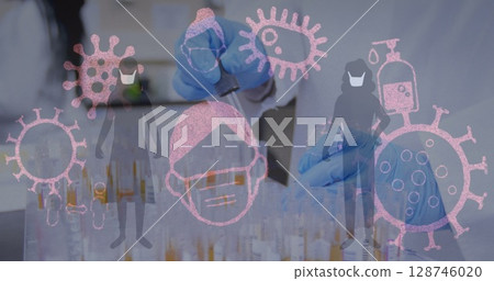 Image of virus icons over caucasian scientist in lab Image of virus icons over caucasian scientist in lab 128746020