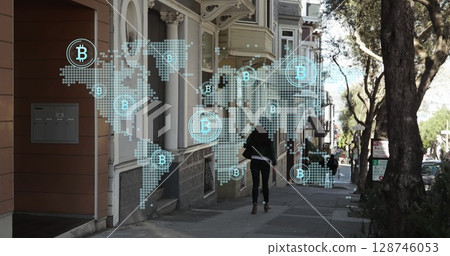 Bitcoin icons over world map against read view of a woman walking on the street 128746053