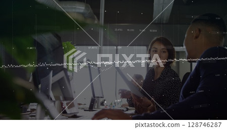 Image of financial data processing over diverse business people in office 128746287