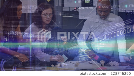 Image of lights and data processing over diverse female and male coworkers in office Image of lights and data processing over diverse female and male coworkers in office 128746290