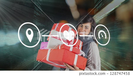Image of digital icons and data processing over caucasian woman with presents 128747458