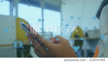 Image of network of connections over person using smartphone 128747491
