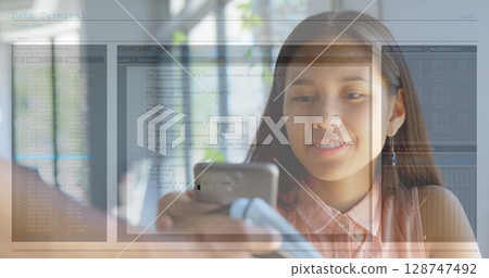 Image of digital interface over women using smartphone 128747492