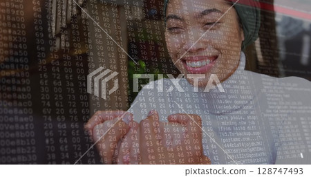 Image of data processing against mid section of a man holding hands of woman in hijab at cafe 128747493