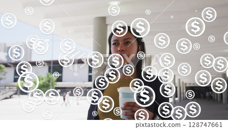 Image of dollar symbols over woman drinking takeaway coffee 128747661