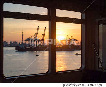 Sunset seen from the ship 128747788