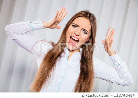 Angry young woman shout. Angry young woman shout. 128748494
