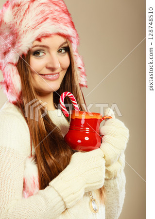 Woman with christmas sweets Woman with christmas sweets 128748510