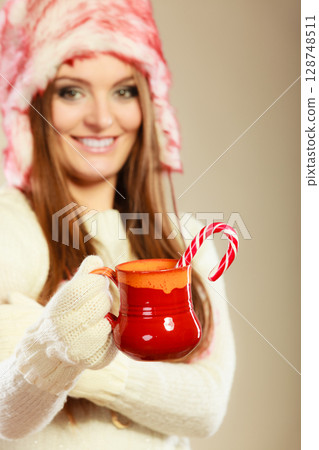 Woman with christmas sweets 128748511