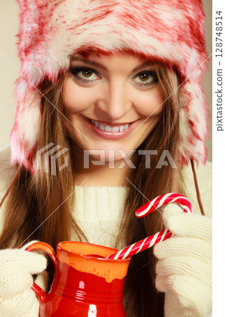 Woman with christmas sweets Woman with christmas sweets 128748514