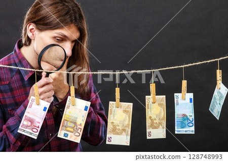 Man verify money cash Man verify money cash 128748993