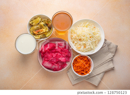 Fermented food promoting gut health with natural probiotics and beverages top view Fermented food promoting gut health with natural probiotics and beverages top view 128750123