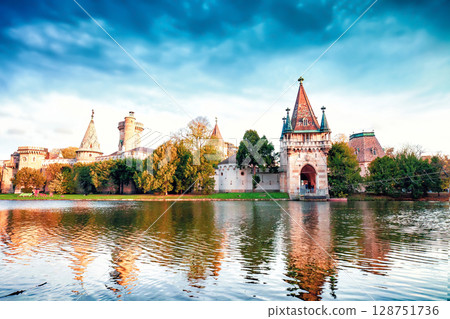 Medieval Franzensburg castle on lake in autumn Laxenburg park, Lower Austria 128751736