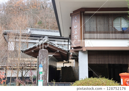 Shima Onsen: A view of the Yumoto Shimakan Inn, a hotel associated with a great literary figure, taken from the road side Shima Onsen: A view of the Yumoto Shimakan Inn, a hotel associated with a great literary figure, taken from the road side 128752176