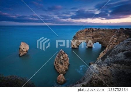 Arch Rock & Sunset 128752384