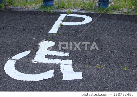 Parking lot with wheelchair mark 128752493
