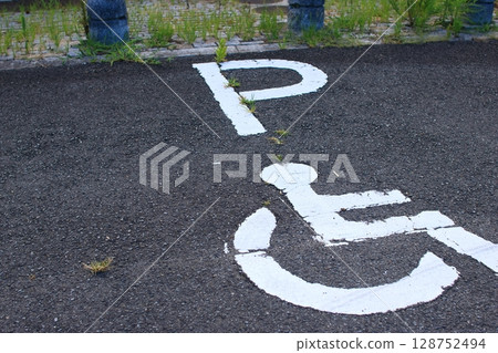 Parking lot with wheelchair mark 128752494
