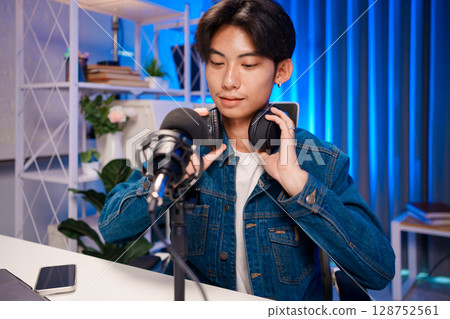 Headphones On for Podcast Session Headphones On for Podcast Session 128752561