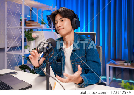 Podcast host sharing opinion in studio Podcast host sharing opinion in studio 128752589