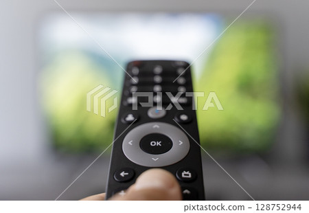 Switching TV Channels with Remote Control Switching TV Channels with Remote Control 128752944