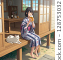 A woman in a yukata drinking beer in an old house 128753032