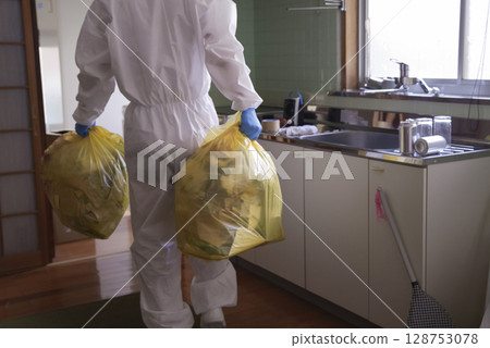 Special cleaners working in protective clothing Special cleaners working in protective clothing 128753078