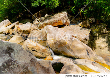 A small waterfall. A small waterfall. 128753243