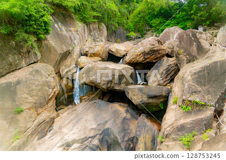 A small waterfall. A small waterfall. 128753245