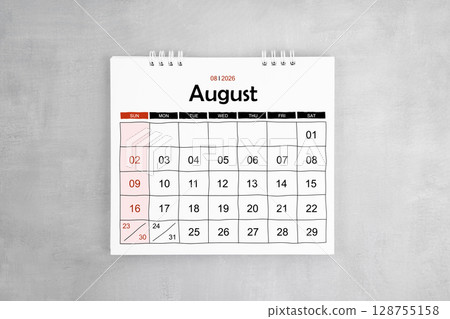 August 2026 desk calendar on gray cement wall background. Page of annual monthly calendar. 128755158