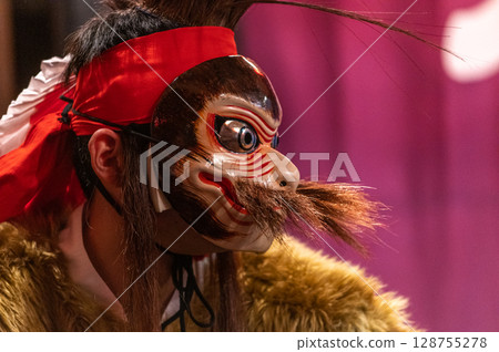 Traditional performing art "Iwami Kagura" - the world of powerful masks and dance 128755278