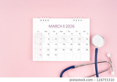 March 2026 desk calendar and stethoscope on pink background, Medical appointment concept. 128755310