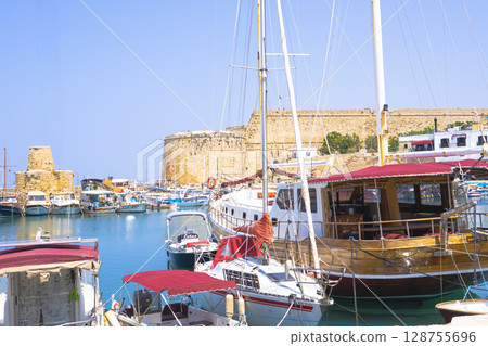 Photo of the old port of Kyrenia in the Turkish Republic of Northern Cyprus with its colorful boats moored 128755696