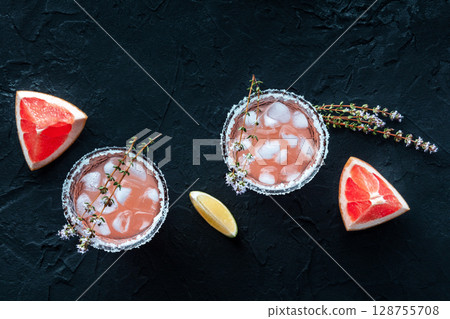 Salty Dog cocktail with fresh grapefruit juice, lime juice, and thyme Salty Dog cocktail with fresh grapefruit juice, lime juice, and thyme 128755708