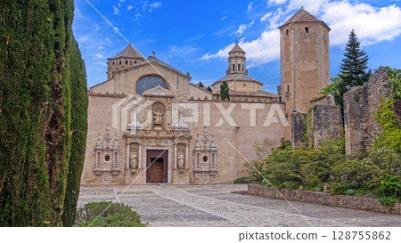 Poblet Monastery from main square without people Poblet Monastery from main square without people 128755862