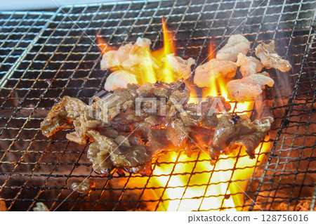 Juicy meat with a blazing flame Juicy meat with a blazing flame 128756016