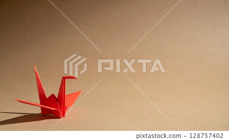 Earth Tone Geometric Pattern and Red Origami Cranes 128757402