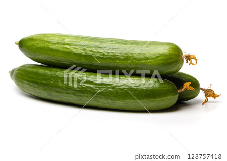 Photo of a small bunch of green natural organic cucumbers isolated on white background 128757418